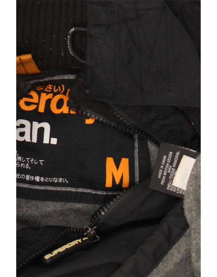 Damska wiatrówka z kapturem Superdry Graphic UK 14 Średni czarny nylon