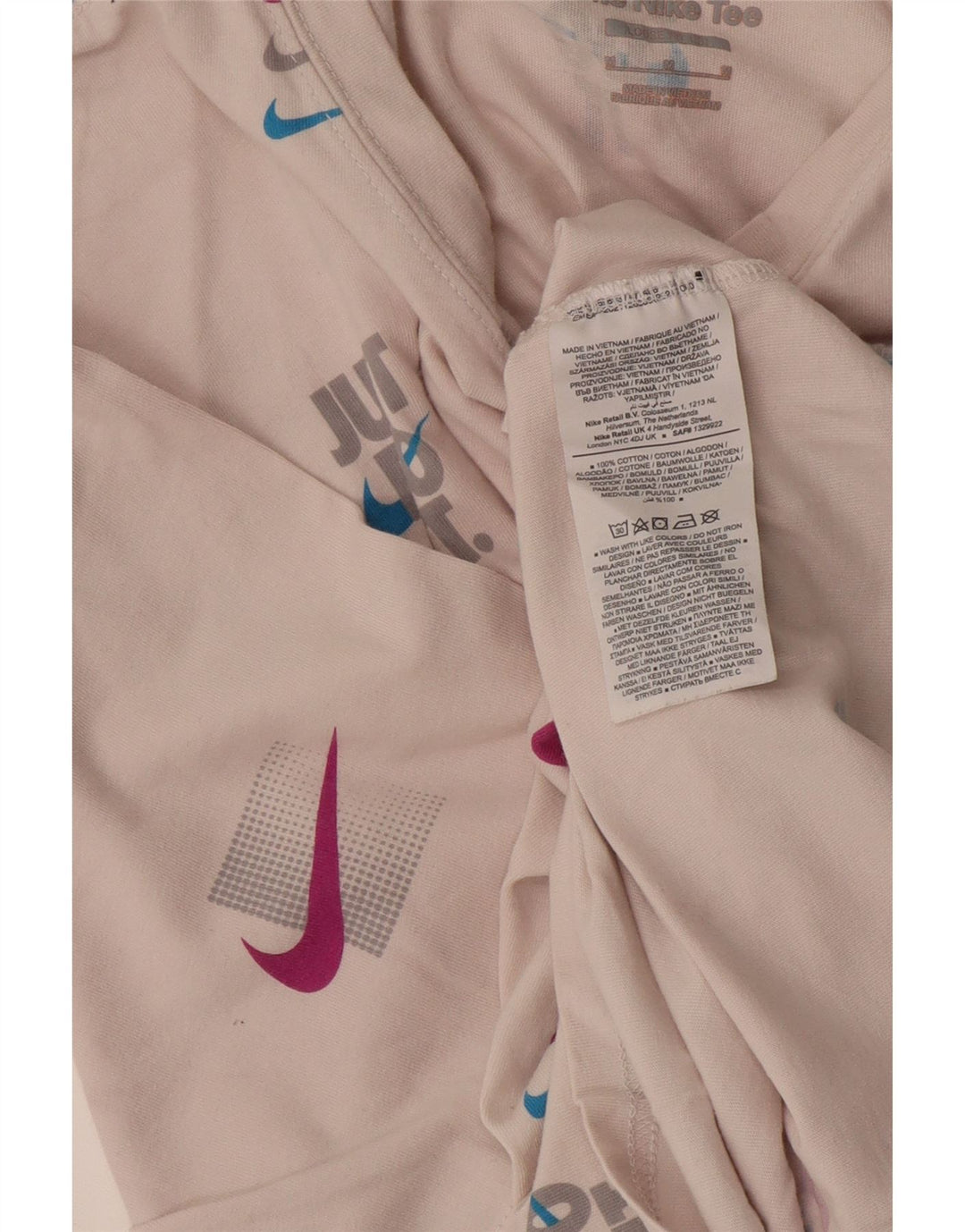 Męska koszulka Nike o luźnym kroju z grafiką, średnia biała bawełna