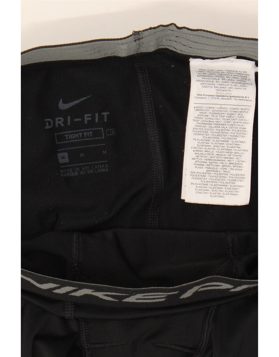 Męskie legginsy Nike o dopasowanym kroju z grafiką, średni czarny poliester