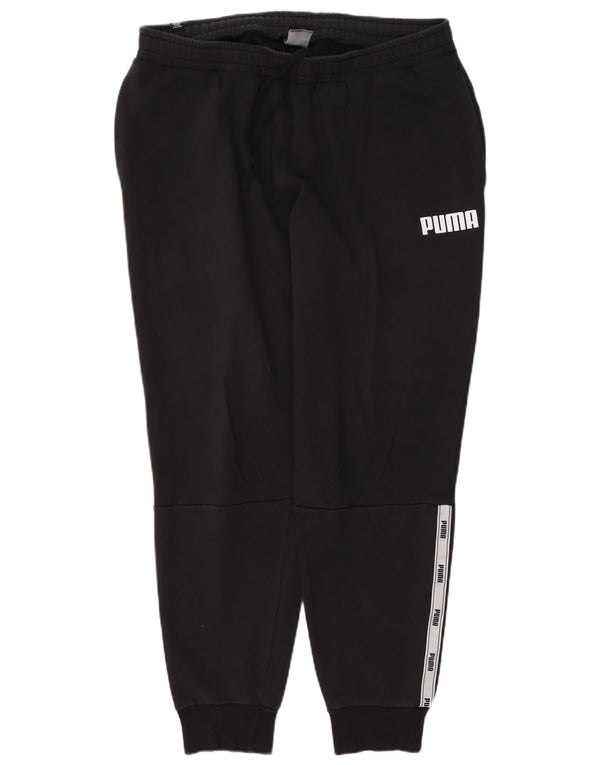 Męskie spodnie dresowe Puma Graphic Joggers XL Czarne, bawełniane, z blokami kolorów