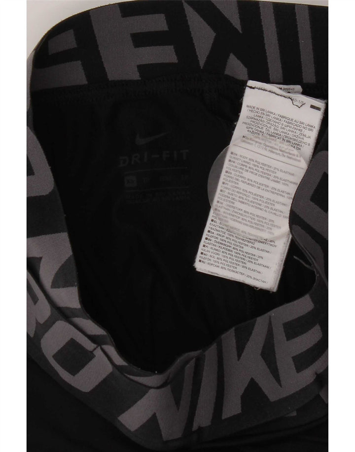 Damskie legginsy Nike Dri Fit Graphic UK 4 XS, czarny poliester