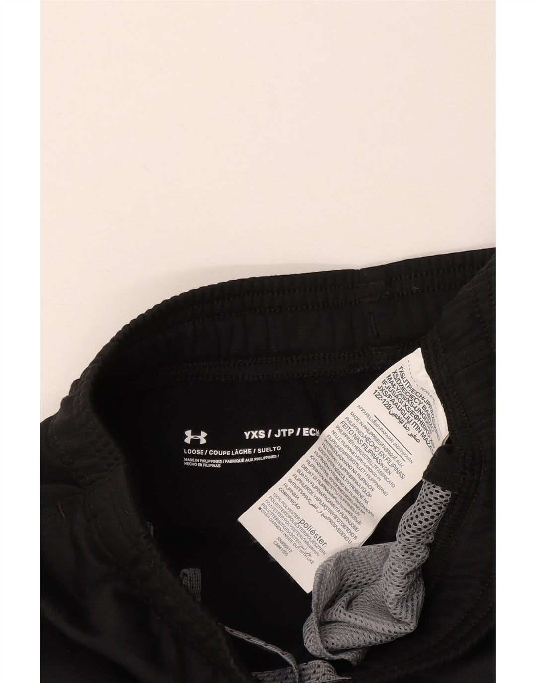 Chłopięce spodnie dresowe UNDER ARMOUR 6-7 lat XS W22 L22 Czarne