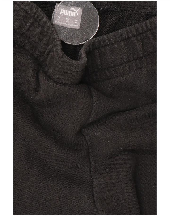 Damskie spodnie dresowe Puma Graphic Joggers UK 12 Medium Black