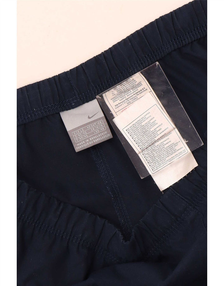 Damskie spodnie dresowe Nike UK 14/16, duże granatowe, poliestrowe