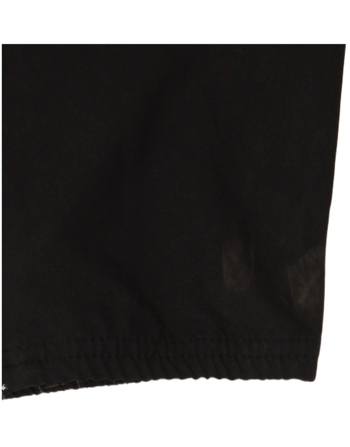 Męskie spodnie dresowe Nike Dri Fit Graphic, średnio czarne, geometryczne