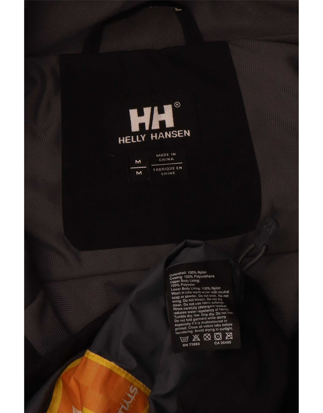 Męska kurtka przeciwdeszczowa Helly Hansen UK 38 Średni czarny nylon w blokach kolorystycznych