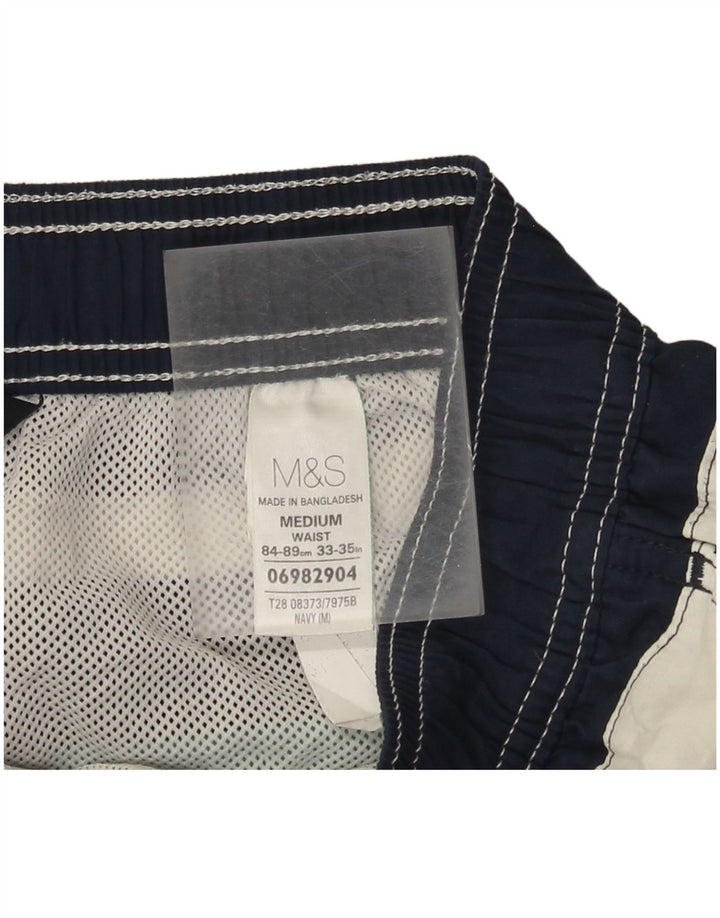 Męskie spodenki kąpielowe Marks & Spencer Blue Harbor, średni kolor granatowy