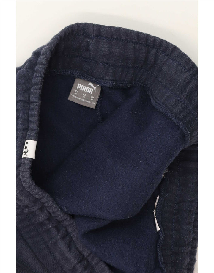 Damskie spodnie dresowe Puma Joggers, średni granat, blok kolorów