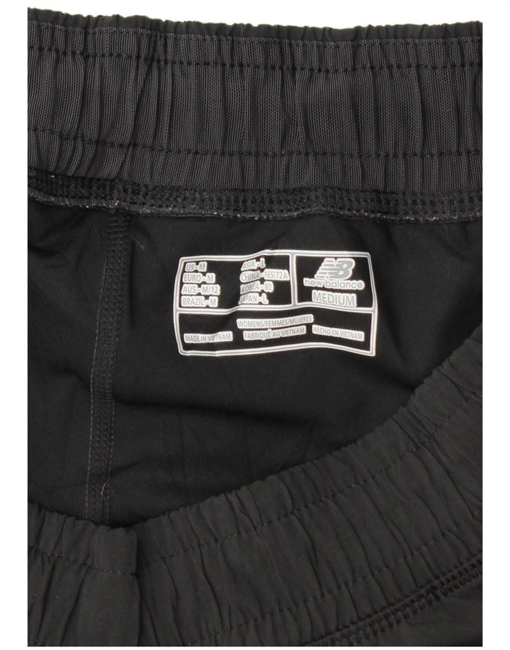 Damskie spodenki sportowe New Balance UK 14, średnie czarne