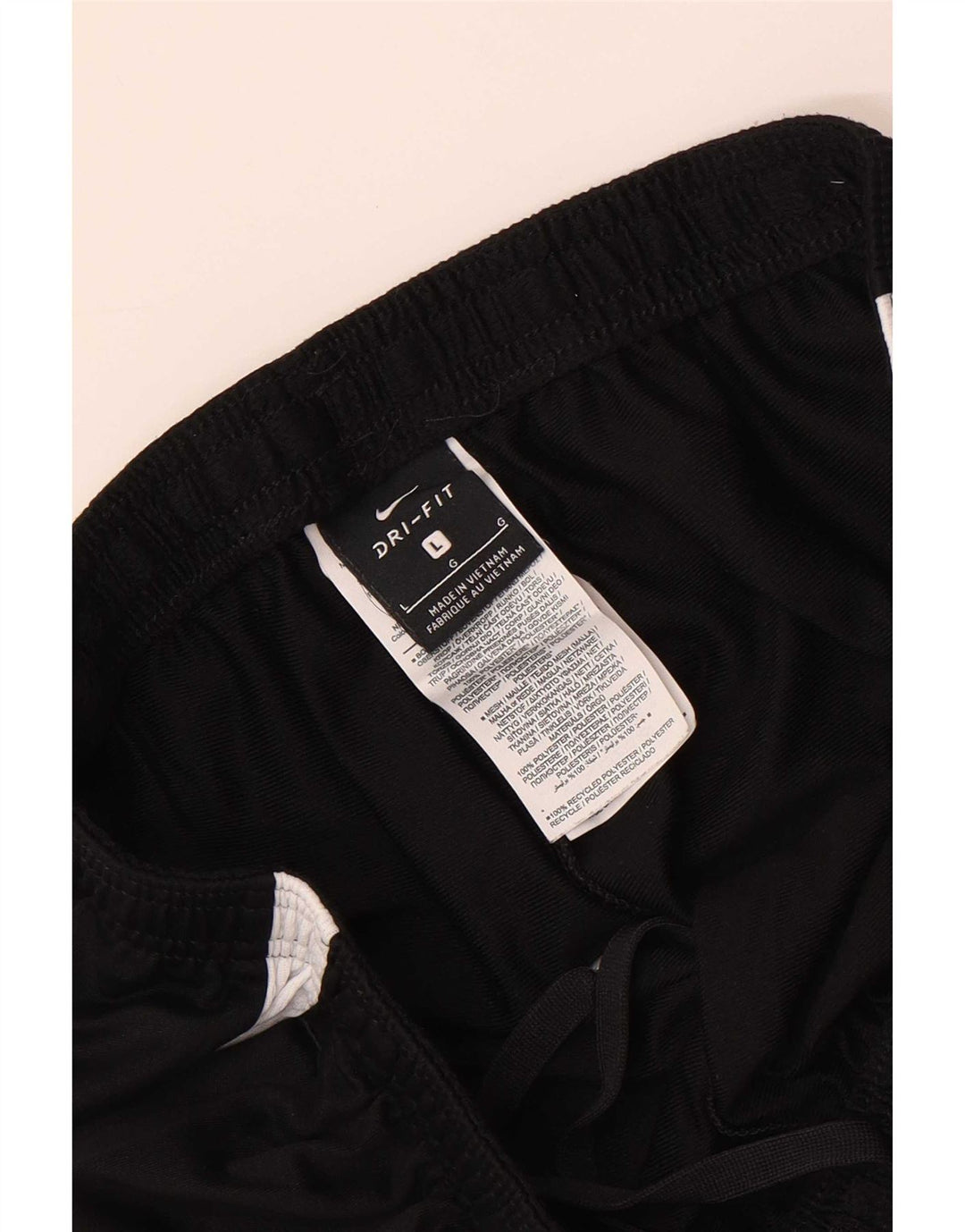 Męskie spodnie dresowe Nike Dri Fit, duży czarny poliester z blokami kolorów
