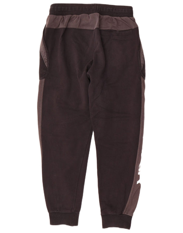 Męskie spodnie dresowe Nike Graphic Tracksuit Joggers w kolorze średniej czerni