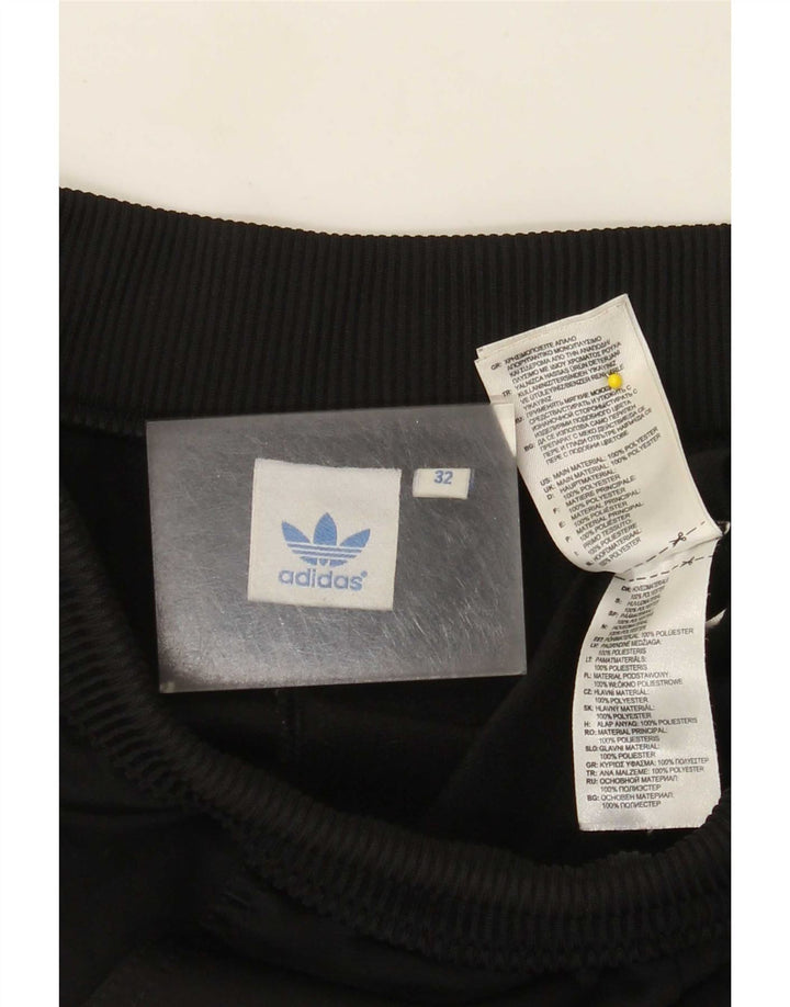 Damskie spodnie dresowe Adidas Capri Joggers EU 32 2XS Czarny poliester
