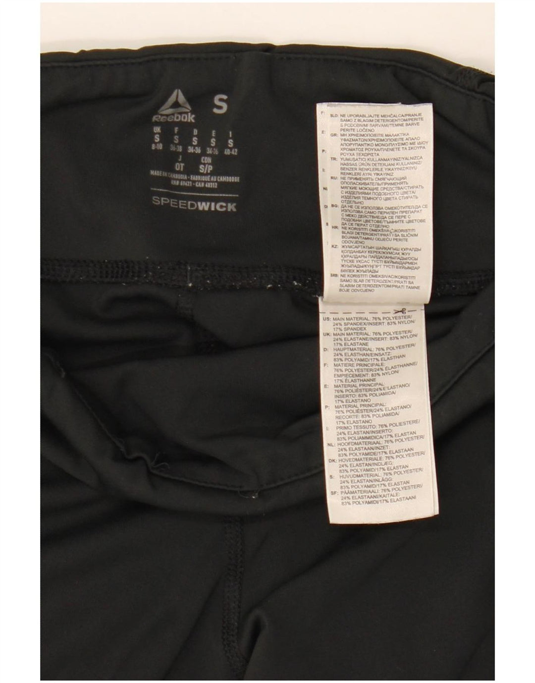 Damskie legginsy Reebok Speedwick Capri UK 8/10 Małe czarne cętki