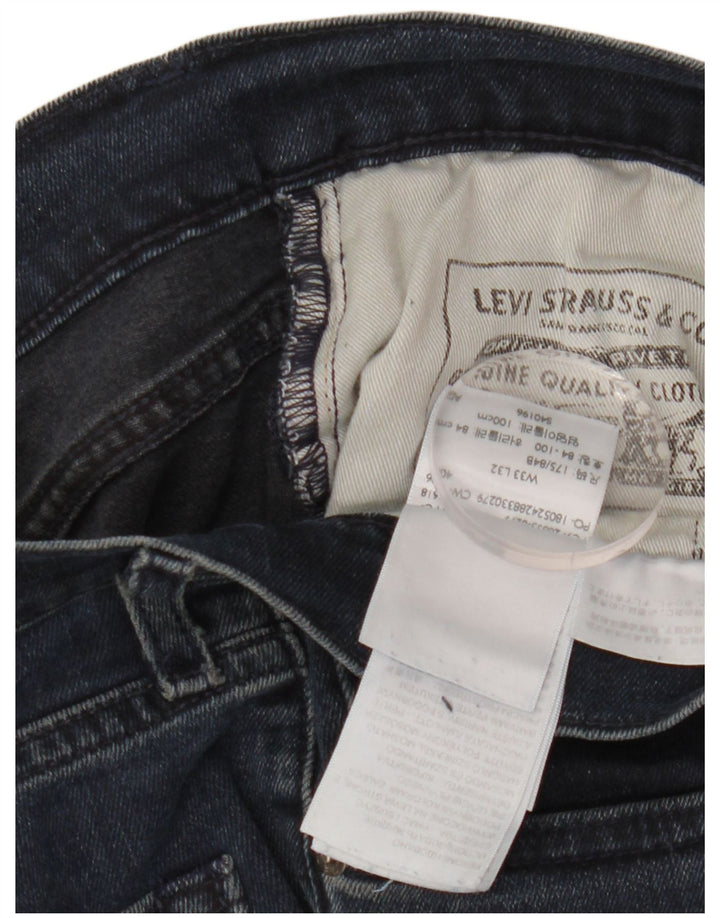 Męskie jeansy Levi's 511 Slim W33 L32 Granatowa bawełna