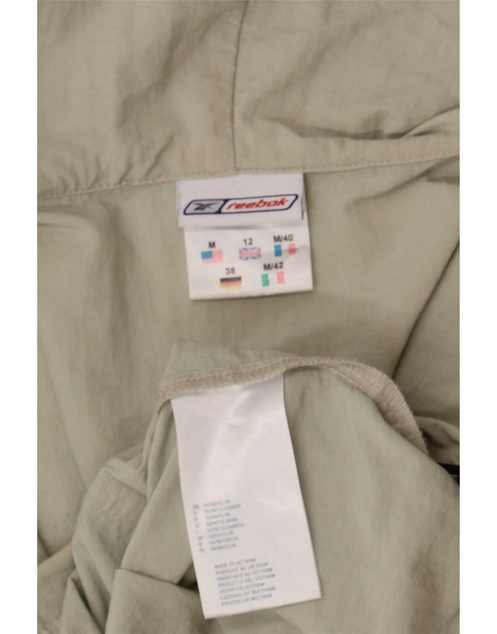 Damska kurtka przeciwdeszczowa Reebok z kapturem UK 12, średni beż, nylon