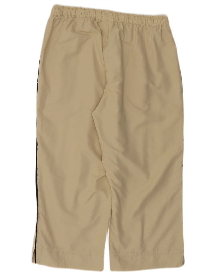 Damskie spodnie dresowe Puma Capri UK 14, duże, beżowe