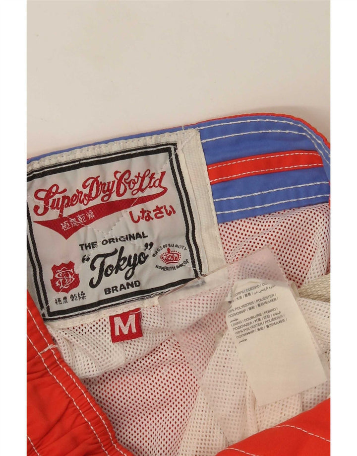 Męskie spodenki kąpielowe Superdry z grafiką, poliester w kolorze średniej pomarańczy
