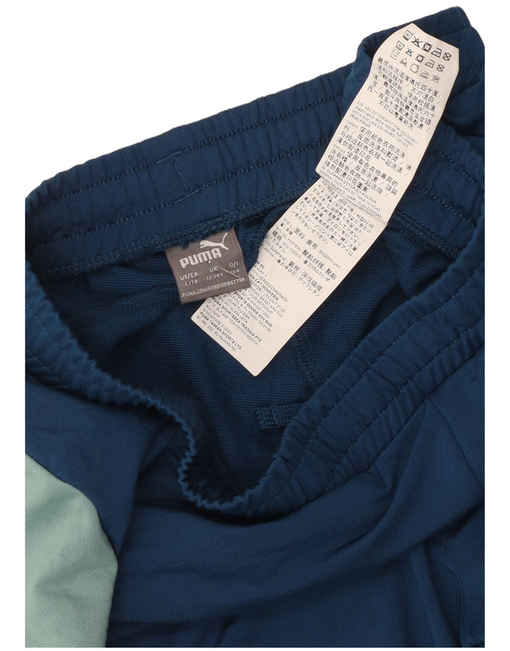 Chłopięce spodnie dresowe Puma 13-14 lat Niebieski poliester z blokami kolorów