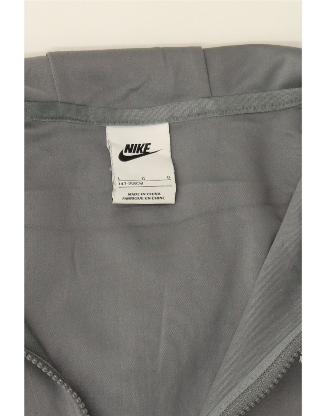 NIKE Boys Zip Hoodie Sweater 12-13 Years Large Grey Polyester Vintage Nike and Second-Hand Nike from Messina Hembry 