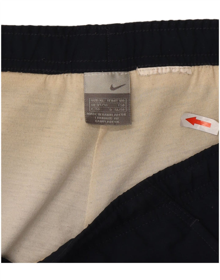Męskie spodnie dresowe Nike XL granatowe