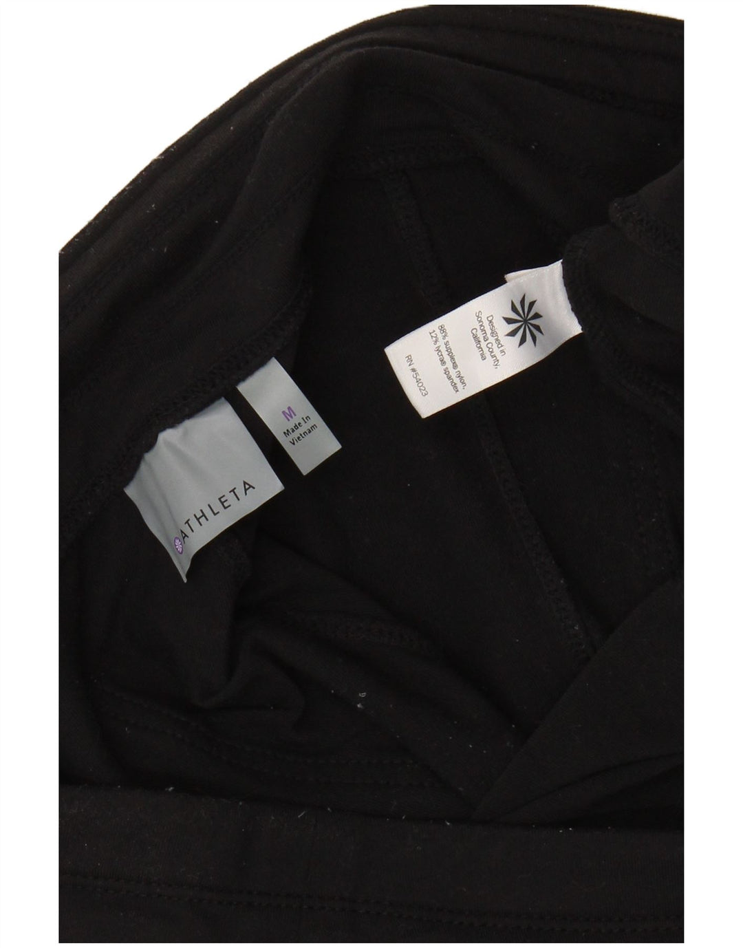 Damskie spodnie dresowe ATHLETA UK 14, średni czarny nylon