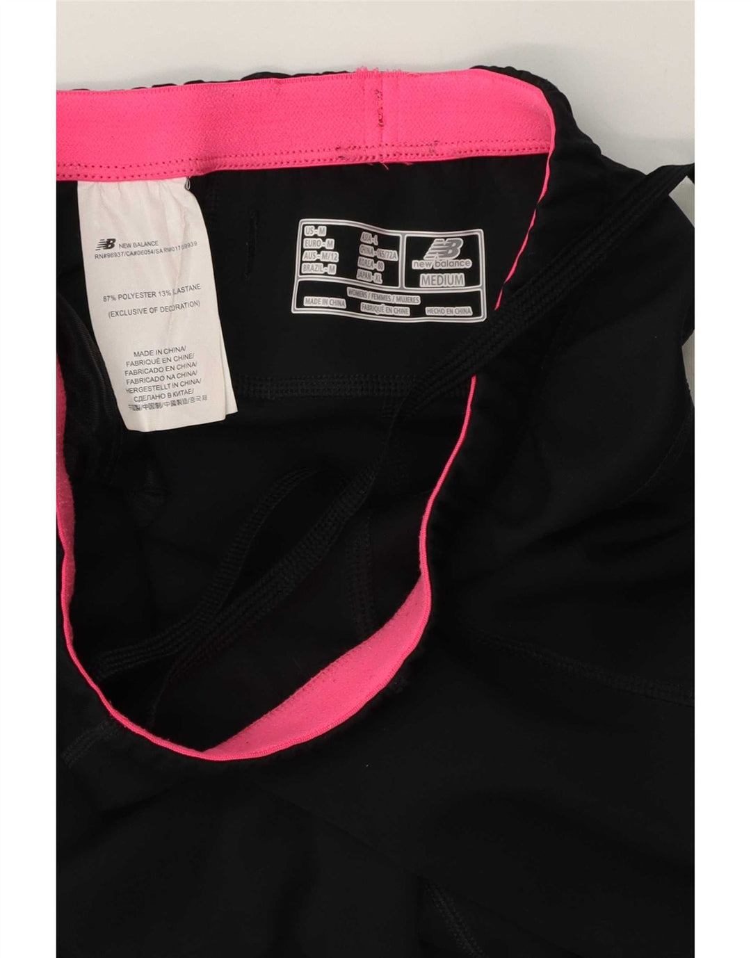 Damskie spodnie dresowe New Balance Capri UK 12, średni czarny poliester
