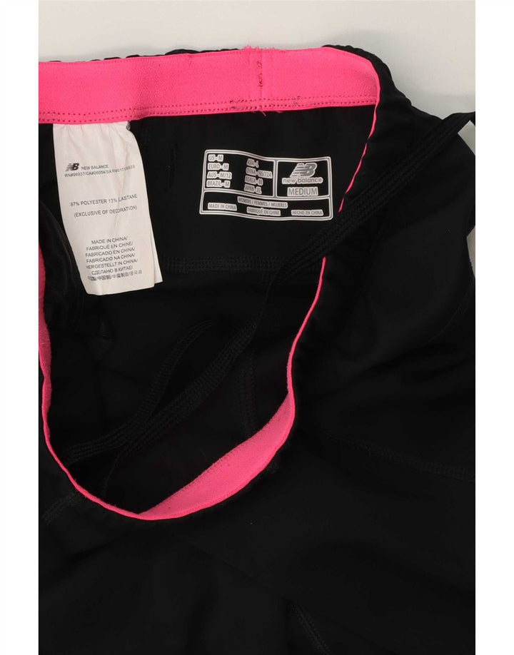 Damskie spodnie dresowe New Balance Capri UK 12, średni czarny poliester
