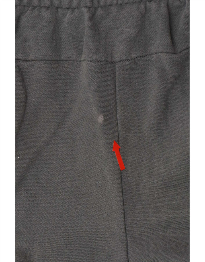 Męskie spodnie dresowe Puma Joggers, średnia zielona bawełna