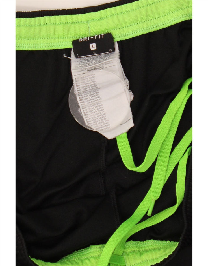 Męskie spodnie dresowe NIKE Dri Fit, duży czarny poliester z blokami kolorów