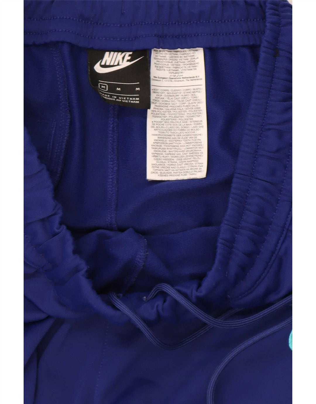Męskie spodnie dresowe Nike Barcelona Graphic w kolorze średnioniebieskim