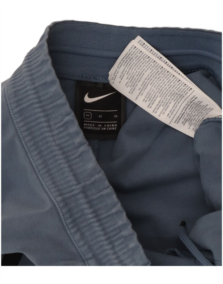 Męskie spodnie dresowe NIKE, bawełna w kolorze średniego błękitu