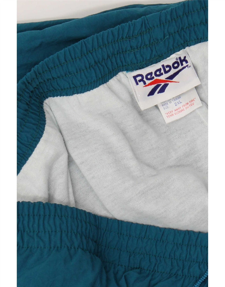 Męskie spodnie dresowe Reebok Joggers 2XL Niebieski nylon