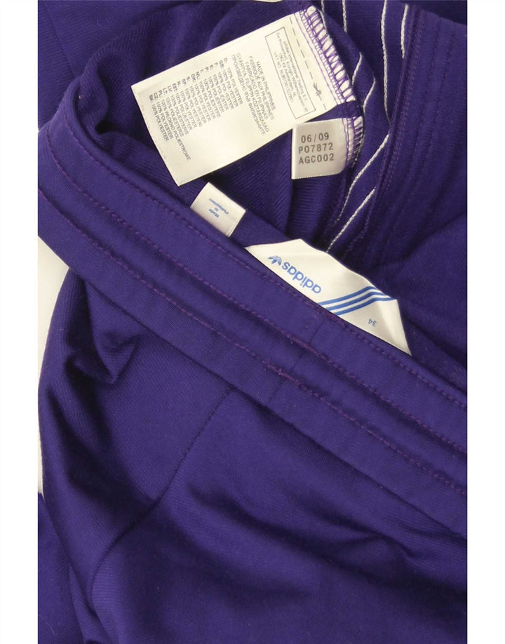 Damskie spodnie dresowe Adidas EU 34 XS Fioletowy poliester
