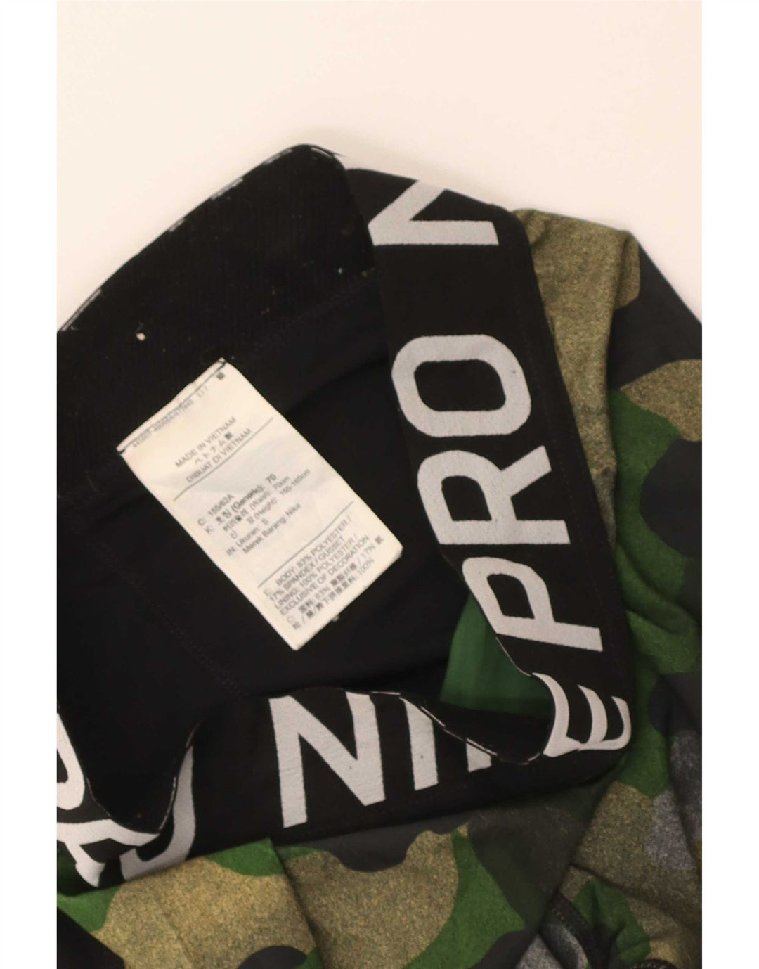 Damskie legginsy Nike Graphic UK 4 XS, czarny kamuflaż, poliester
