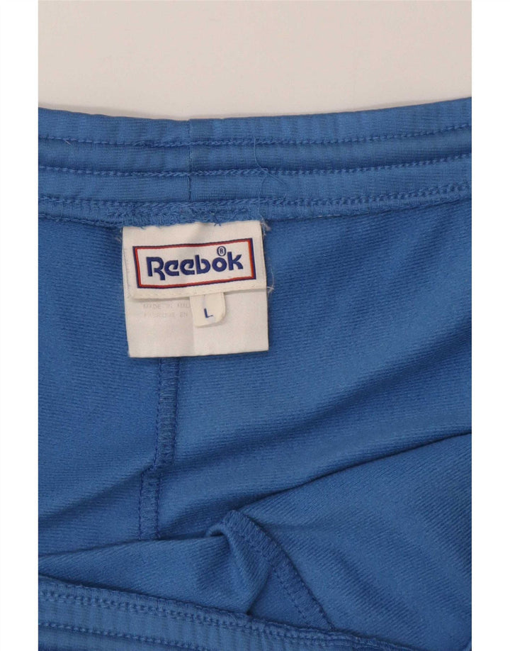 Męskie spodnie dresowe Reebok, duże, niebieskie, z poliestru w blokach kolorów