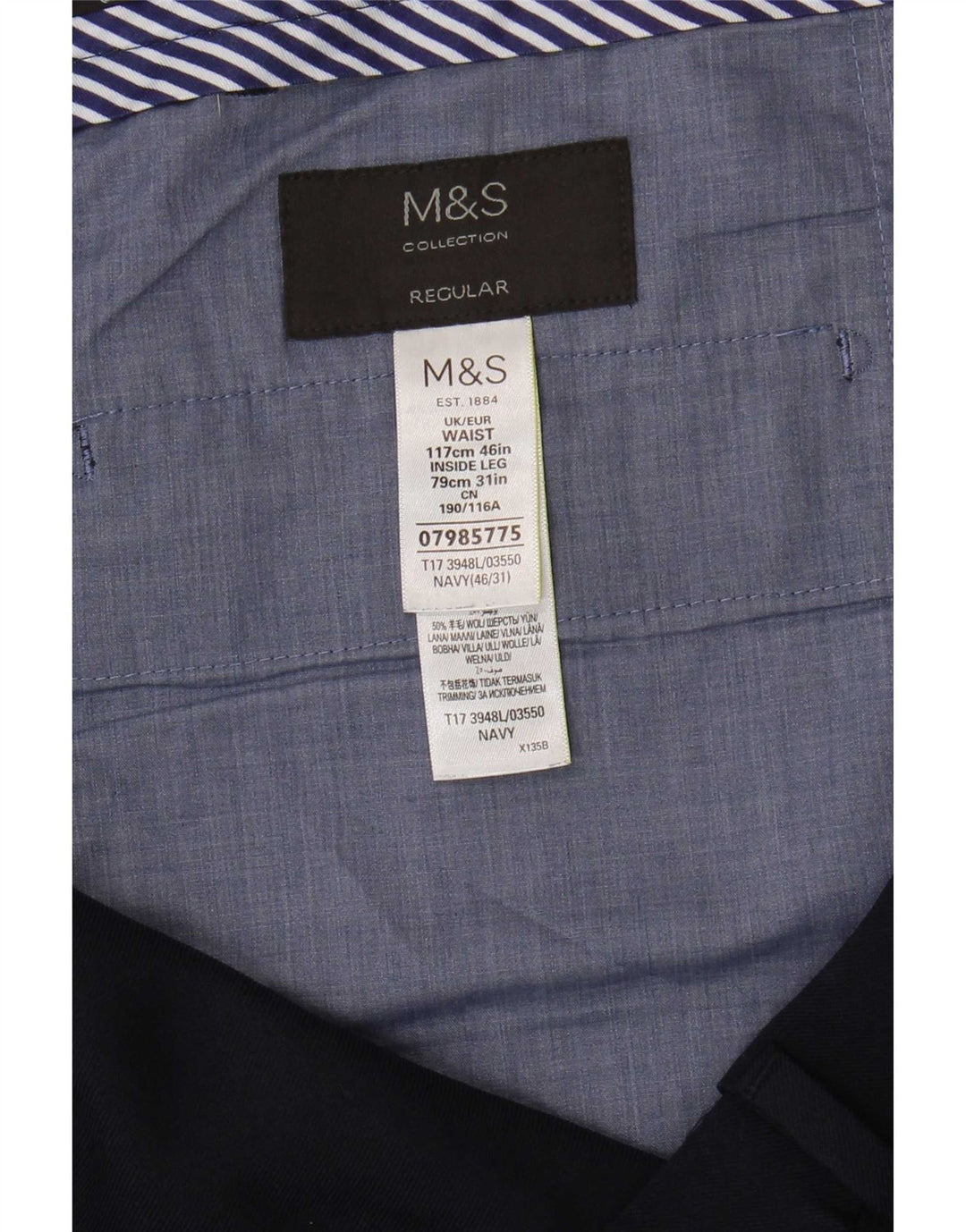 Męskie spodnie garniturowe Marks & Spencer o regularnym kroju W46 L31 Granatowy poliester