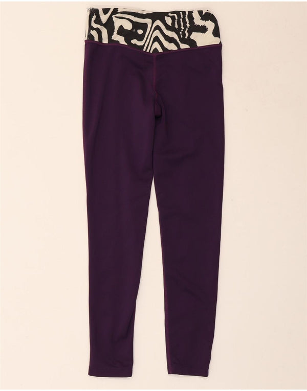 Dziewczęce obcisłe legginsy NIKE w wieku 10-11 lat, w kolorze średniofioletowym, ze zwierzęcym nadrukiem