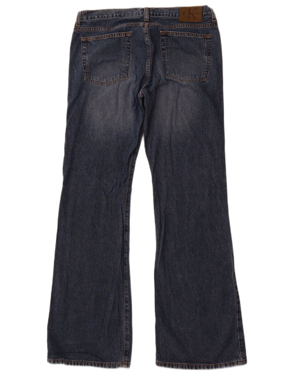 Damskie jeansy Calvin Klein Bootcut US 11, duże, W32, L32, niebieska bawełna