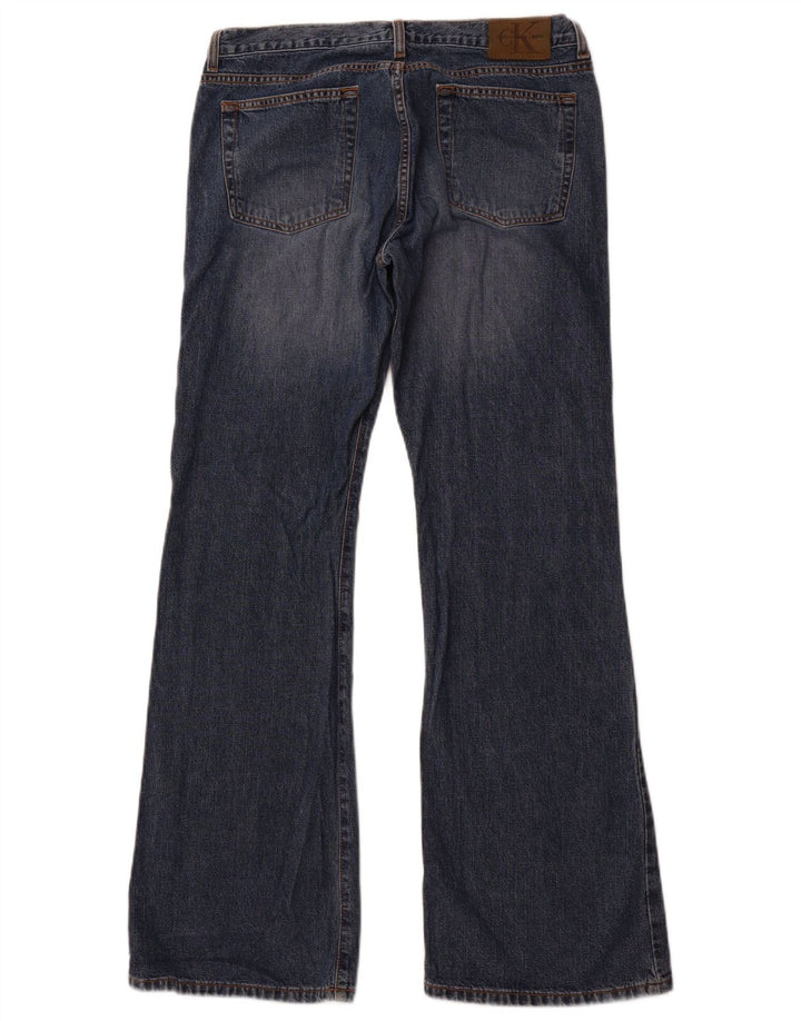 Damskie jeansy Calvin Klein Bootcut US 11, duże, W32, L32, niebieska bawełna