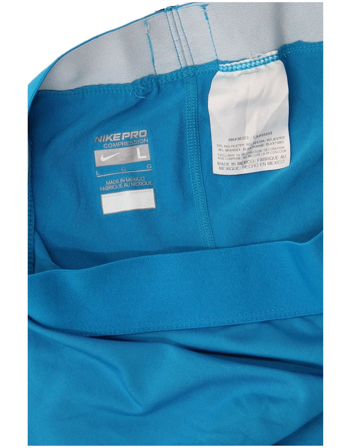 Damskie legginsy NIKE Dri Fit Capri UK 14, duże, niebieskie, poliestrowe