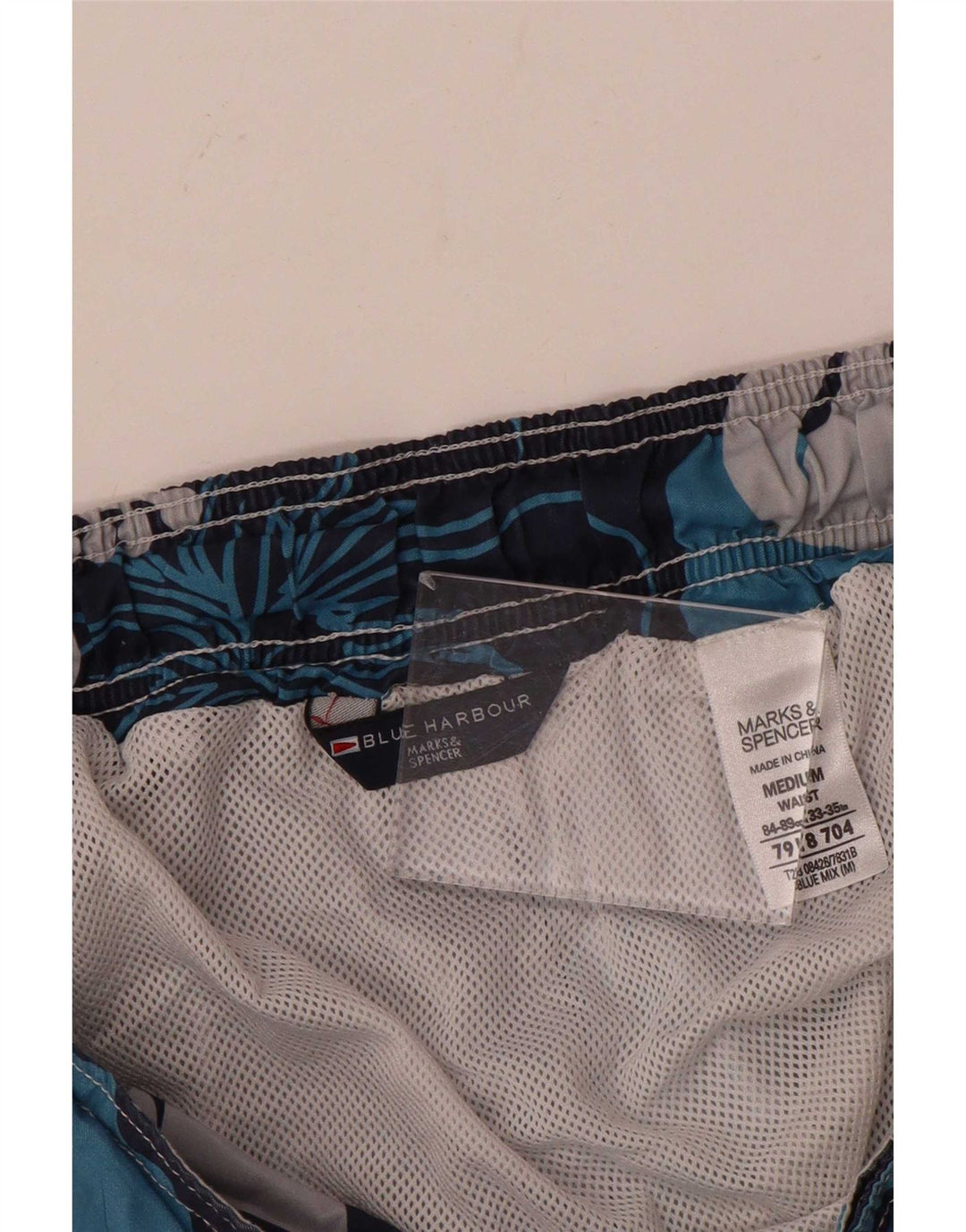 Męskie spodenki kąpielowe Marks & Spencer Blue Harbor, średnio granatowe, w kwiaty
