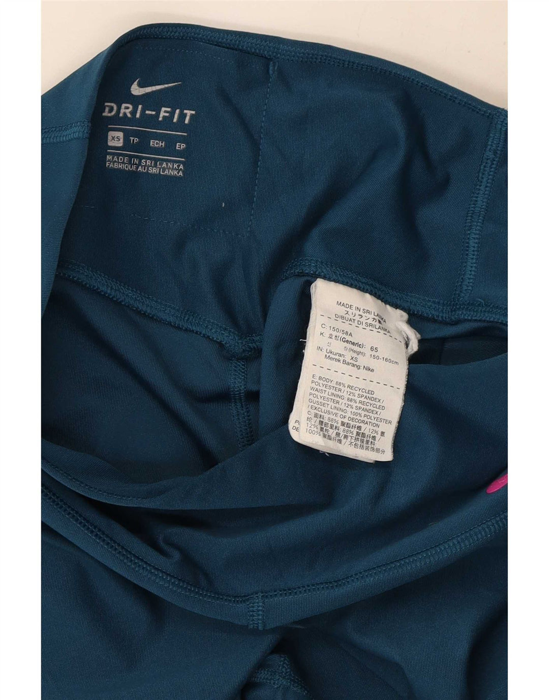 Damskie legginsy Nike Dri Fit Graphic UK 6 XS Niebieskie, poliestrowe