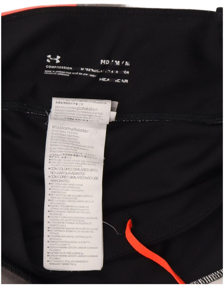 Damskie legginsy UNDER ARMOUR Heat Gear UK 12, średnie czarne geometryczne