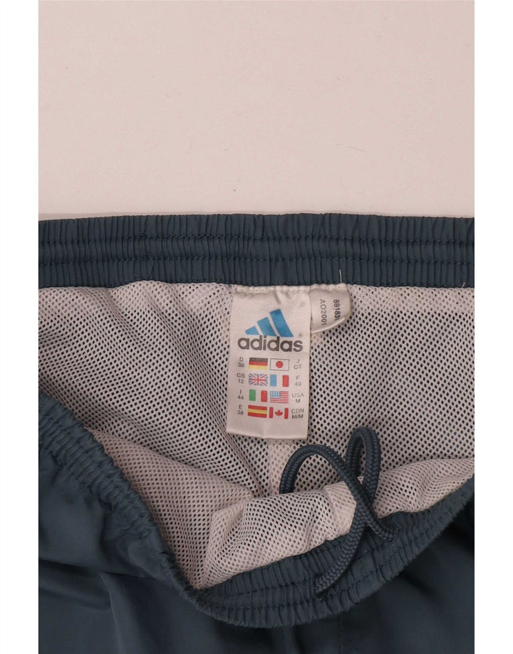Damskie spodnie dresowe Adidas Joggers UK 12 Średni niebieski poliester