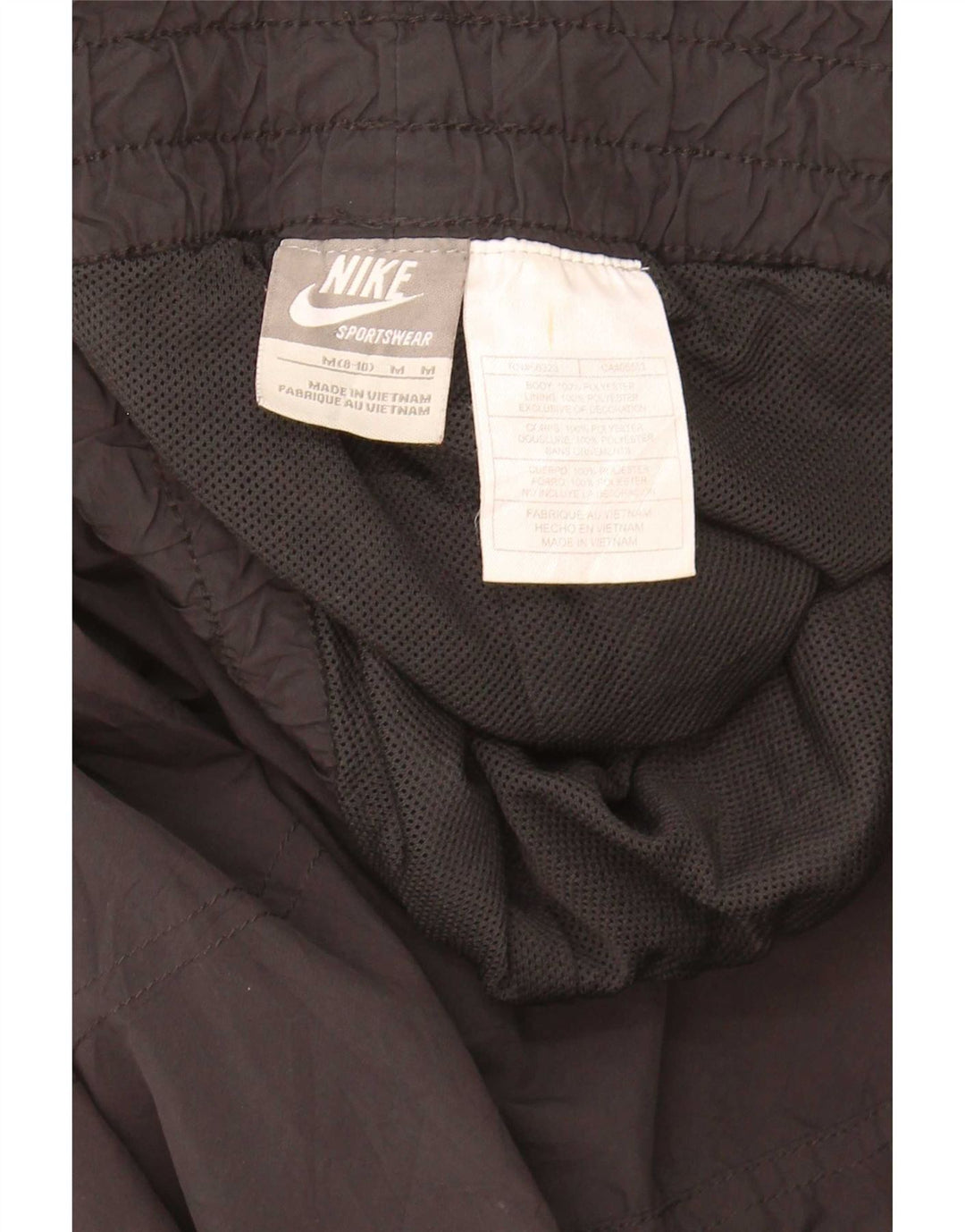 Damskie spodnie dresowe Nike US 8/10, poliester w kolorze średniej czarnej kolorystyki
