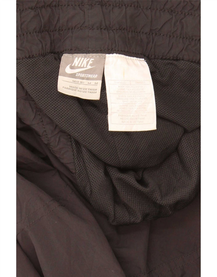 Damskie spodnie dresowe Nike US 8/10, poliester w kolorze średniej czarnej kolorystyki
