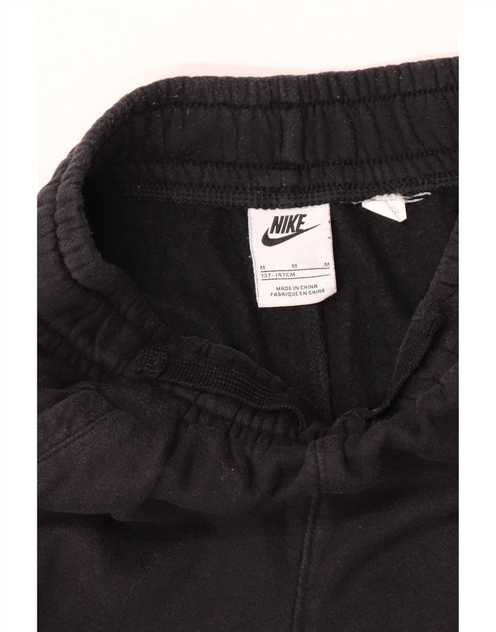 Chłopięce spodnie dresowe Nike z grafiką, 10-11 lat, średnie czarne