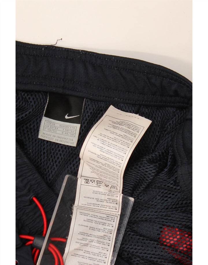 Męskie spodnie dresowe NIKE Capri, nylon w kolorze średniego granatu