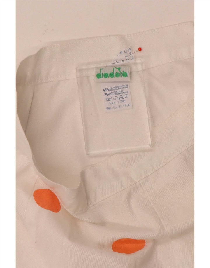 Damska spódniczka mini Diadora UK 12 Medium W26, biała, poliester w kropki