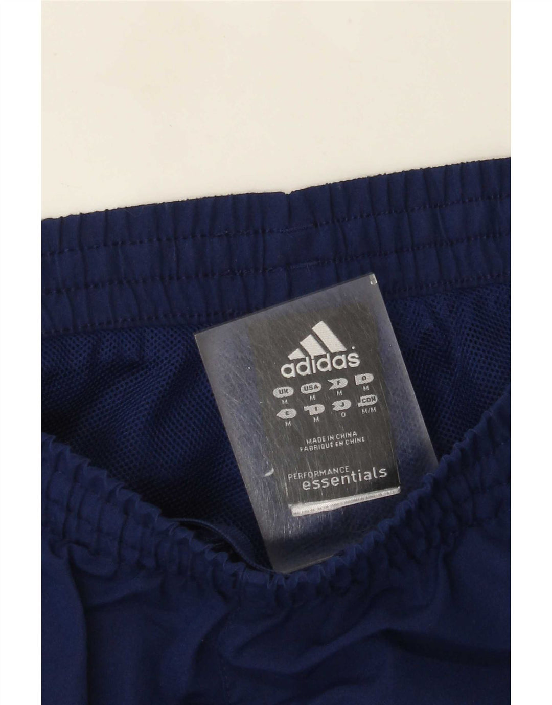 Męskie spodnie dresowe Adidas Climalite, średni granatowy poliester